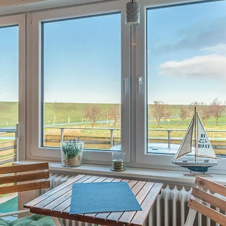Апартаменты Ferienwohnung Deichblick Am Strandweg *