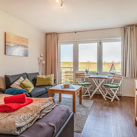 Апартаменты Ferienwohnung Deichblick Am Strandweg